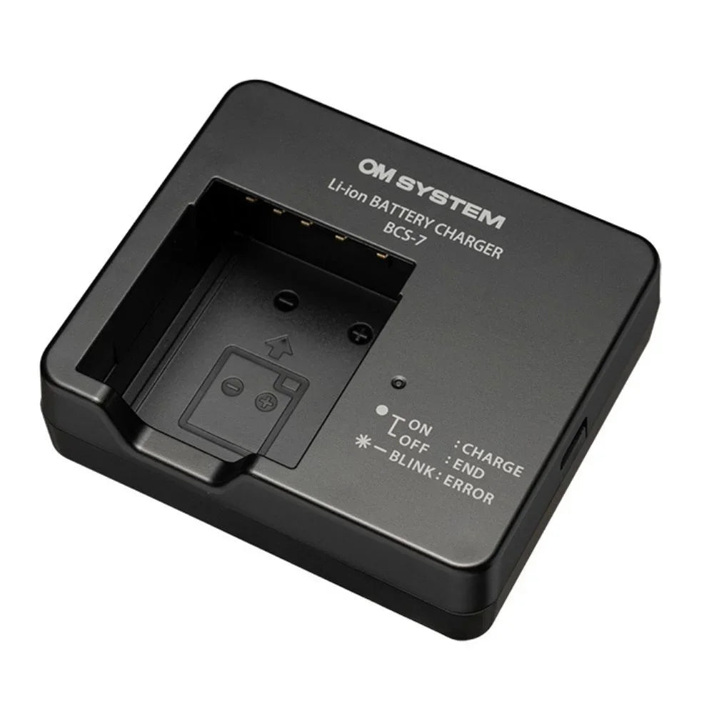 OM SYSTEM BCS-7 acculader